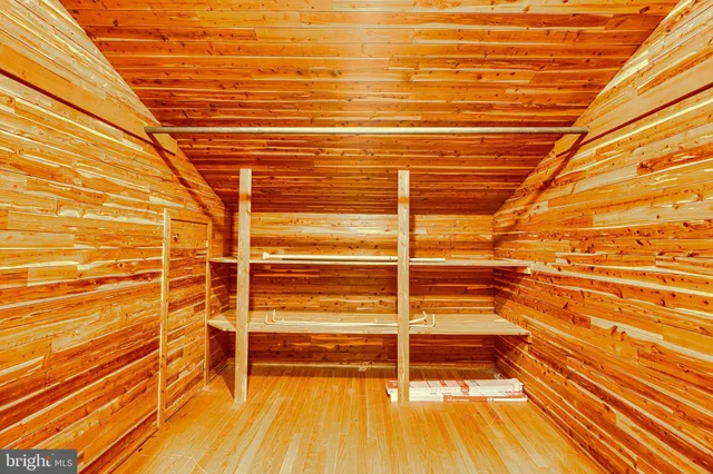 a view of an empty room with a sink