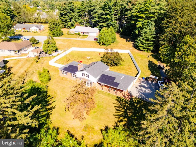 a view of swimming pool with a yard