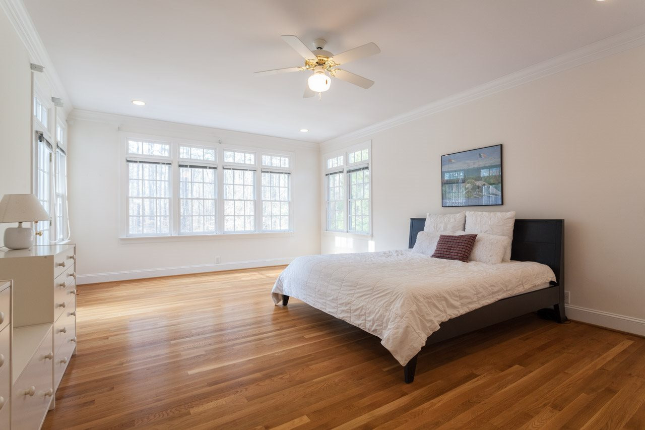 4000 White Chapel Way Raleigh, NC 27615 - Photo 12 of 25 Master Bedroom with doors opening to your private deck and a view that is stunning. Master Bedroom