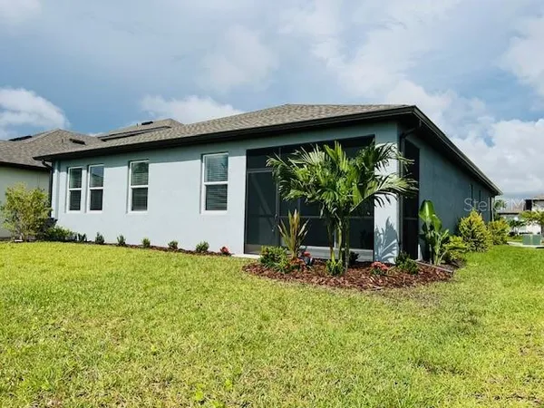 a front view of house with yard