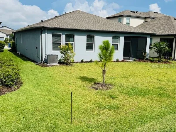a house view with a garden space