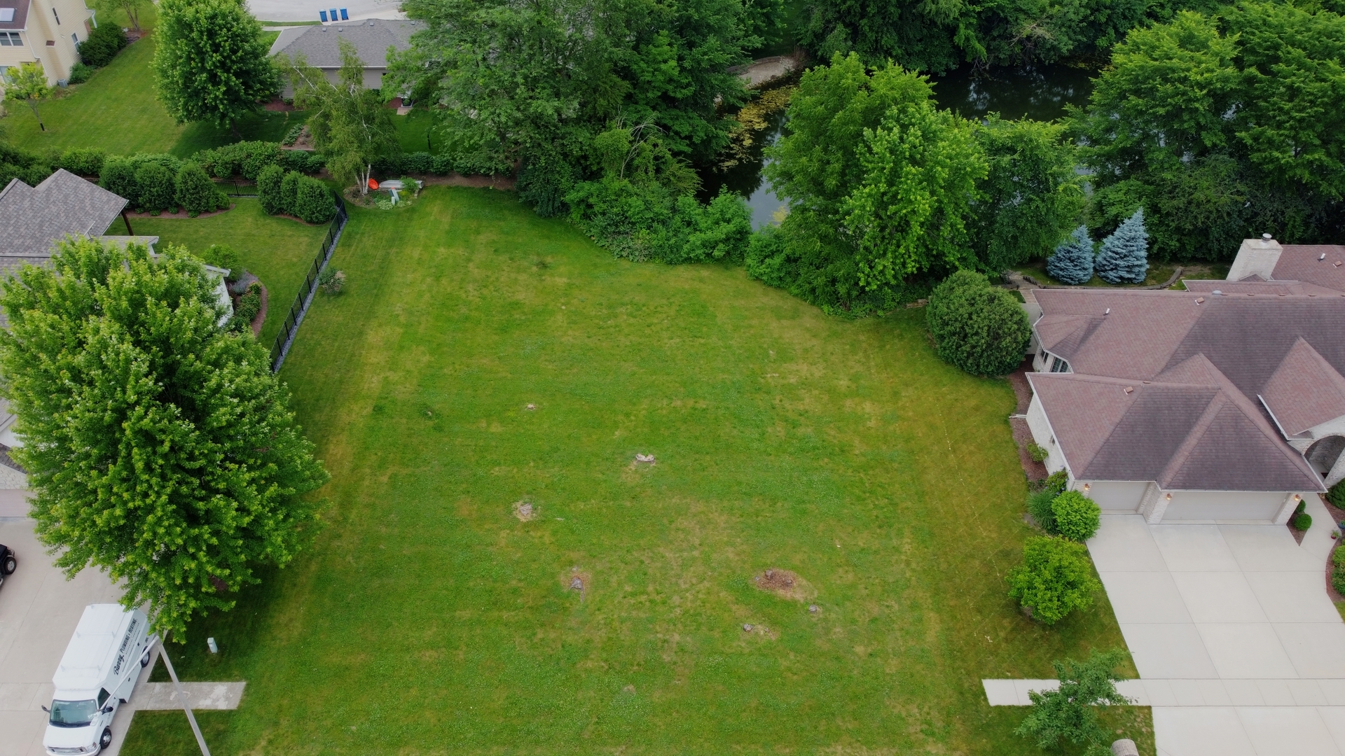 401 Jennings Drive Morris, IL 60450 - Photo 6 of 9 an aerial view of residential houses with outdoor space and trees
