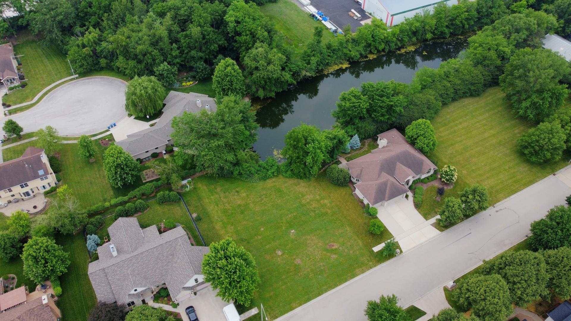 401 Jennings Drive Morris, IL 60450 - Photo 8 of 9 an aerial view of a house with garden space and street view