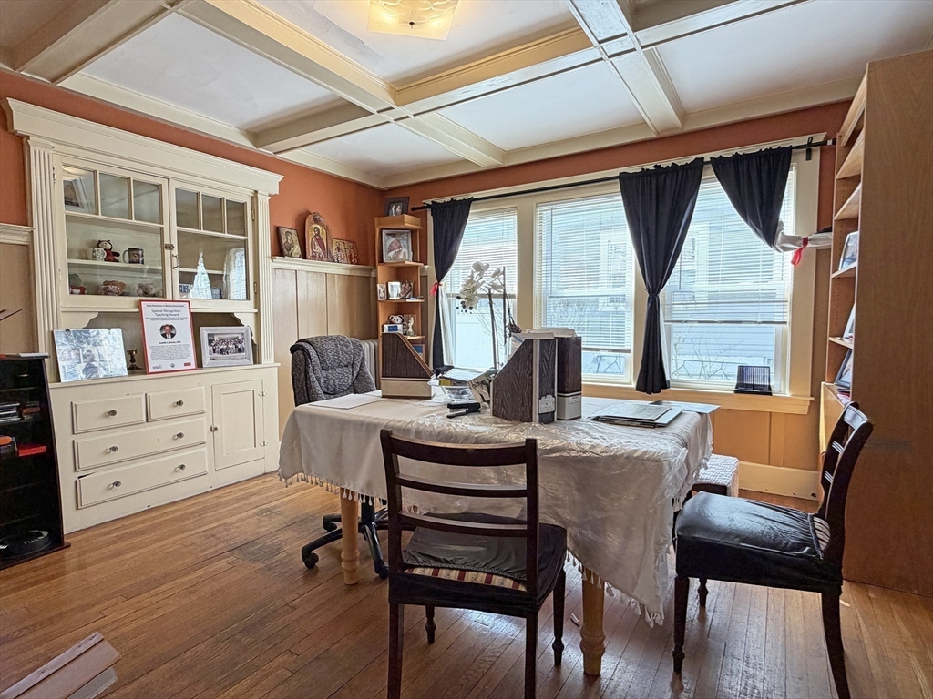 12-14 Nottingham Street Newton, MA 02459 - Photo 8 of 29 a view of a workspace with furniture and a window