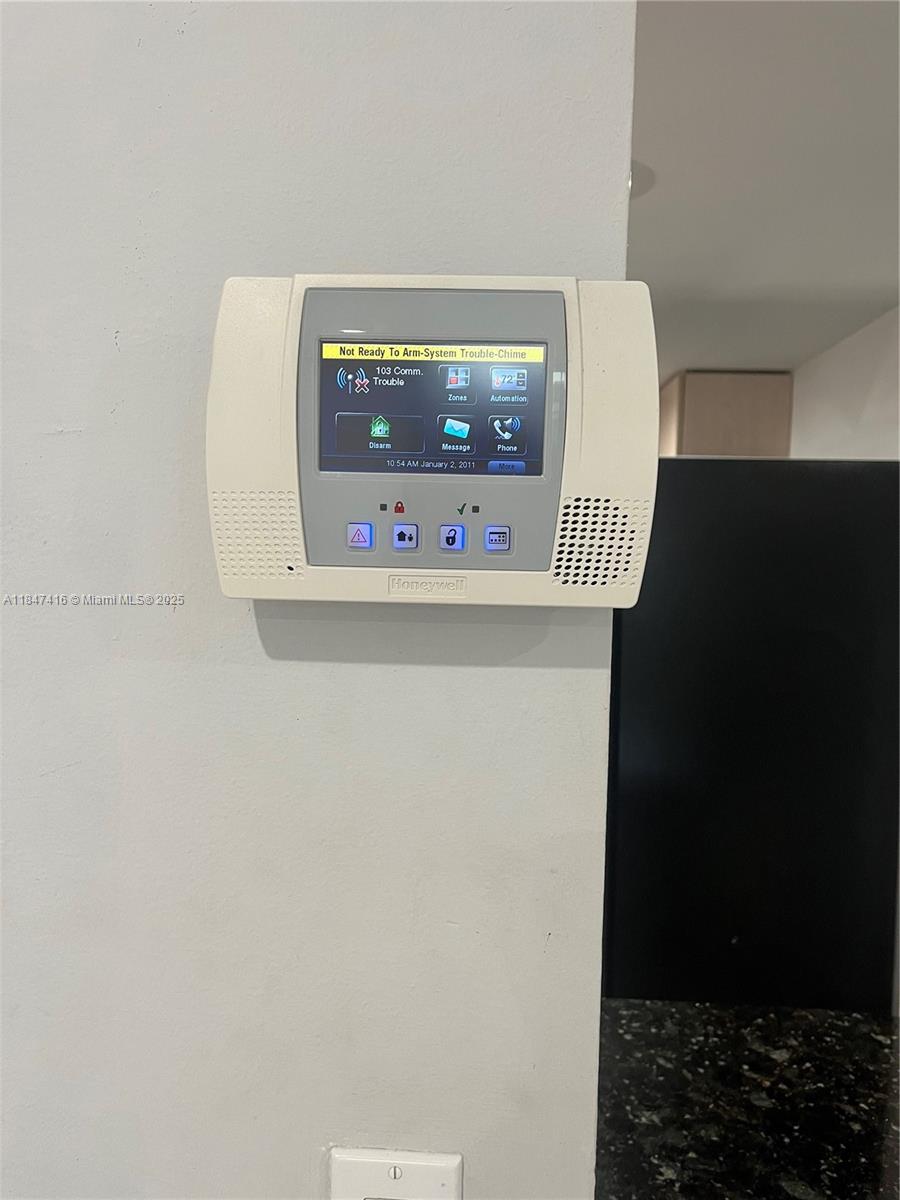 8404 West Sample Road, Unit 131 Coral Springs, FL 33065 - Photo 11 of 36 a view of utility room