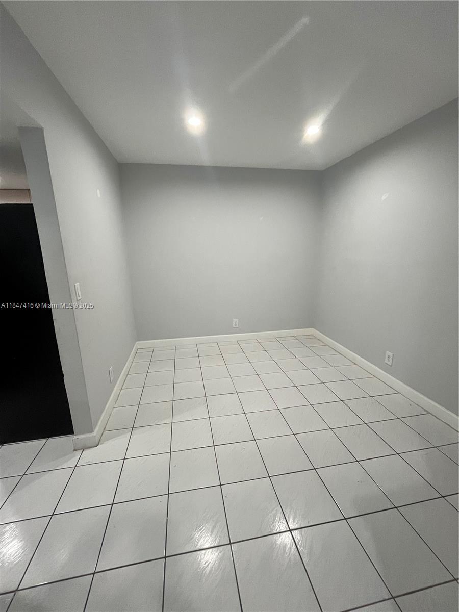8404 West Sample Road, Unit 131 Coral Springs, FL 33065 - Photo 27 of 36 a view of an empty room