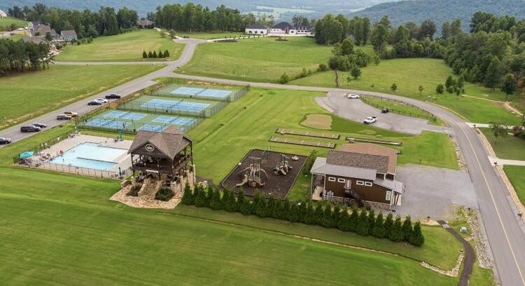 245 Lookout View Drive Jasper, TN 37347 - Photo 25 of 37 an aerial view of a golf course with a swimming pool