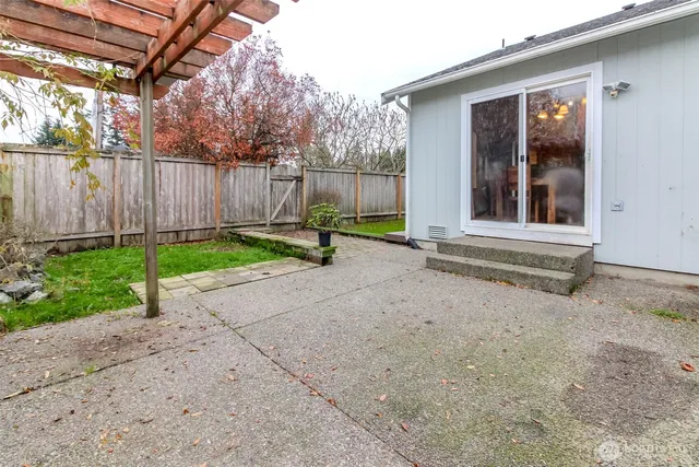 a backyard of a house with lots of green space