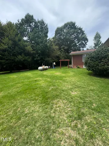 a view of a backyard with a garden