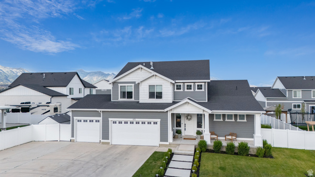 870 North Ada Loop Lehi, UT 84048 - Photo 2 of 51 Modern exterior with gray siding and white trim