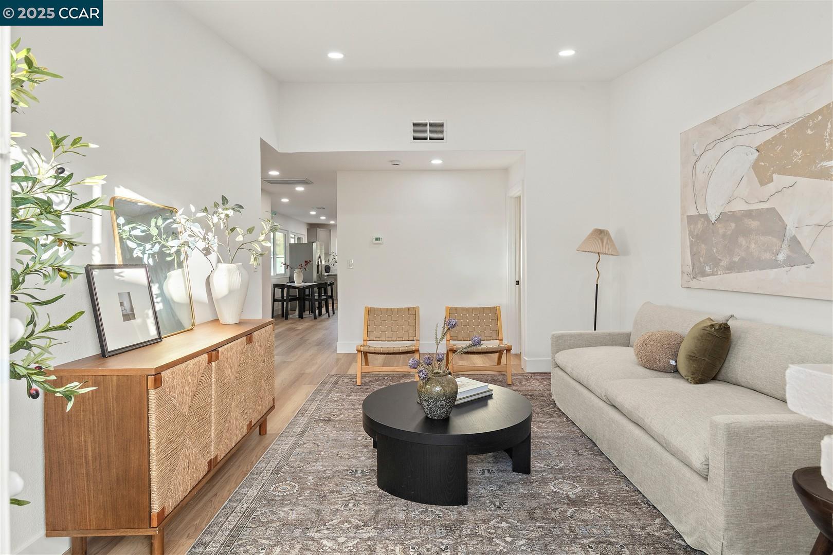3575 Desanie Circle Bay Point, CA 94565 - Photo 15 of 37 a living room with furniture and a wooden floor