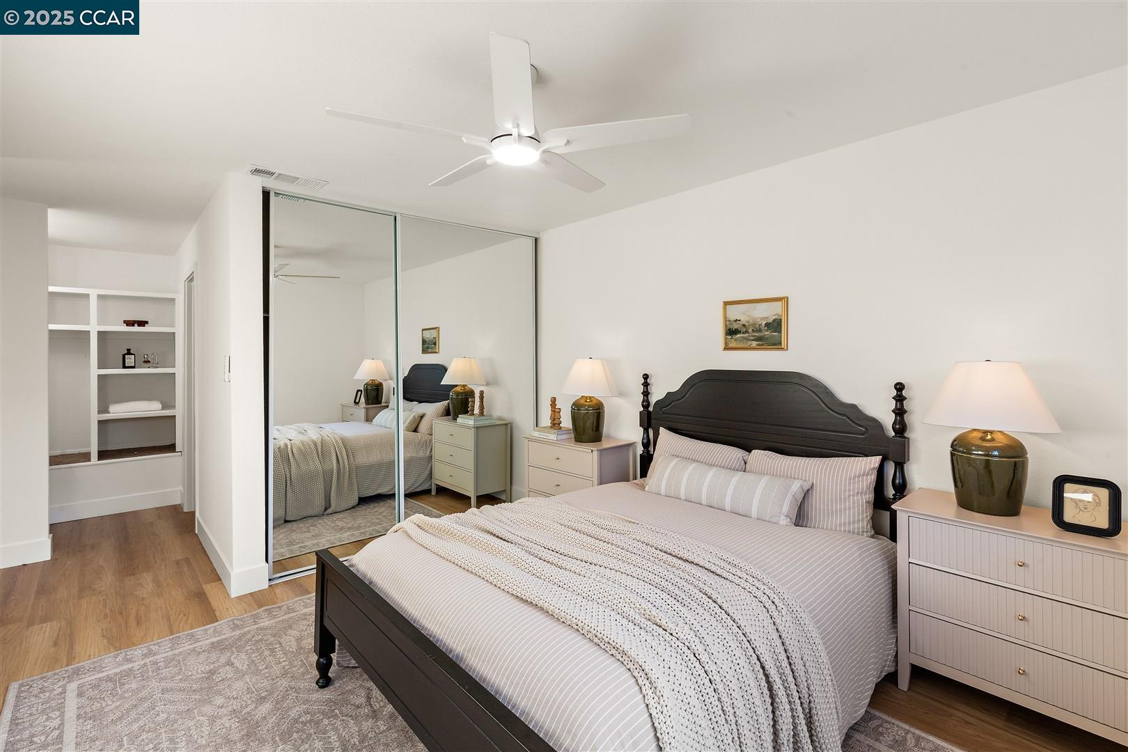 3575 Desanie Circle Bay Point, CA 94565 - Photo 21 of 37 a bedroom with a bed and wooden floor