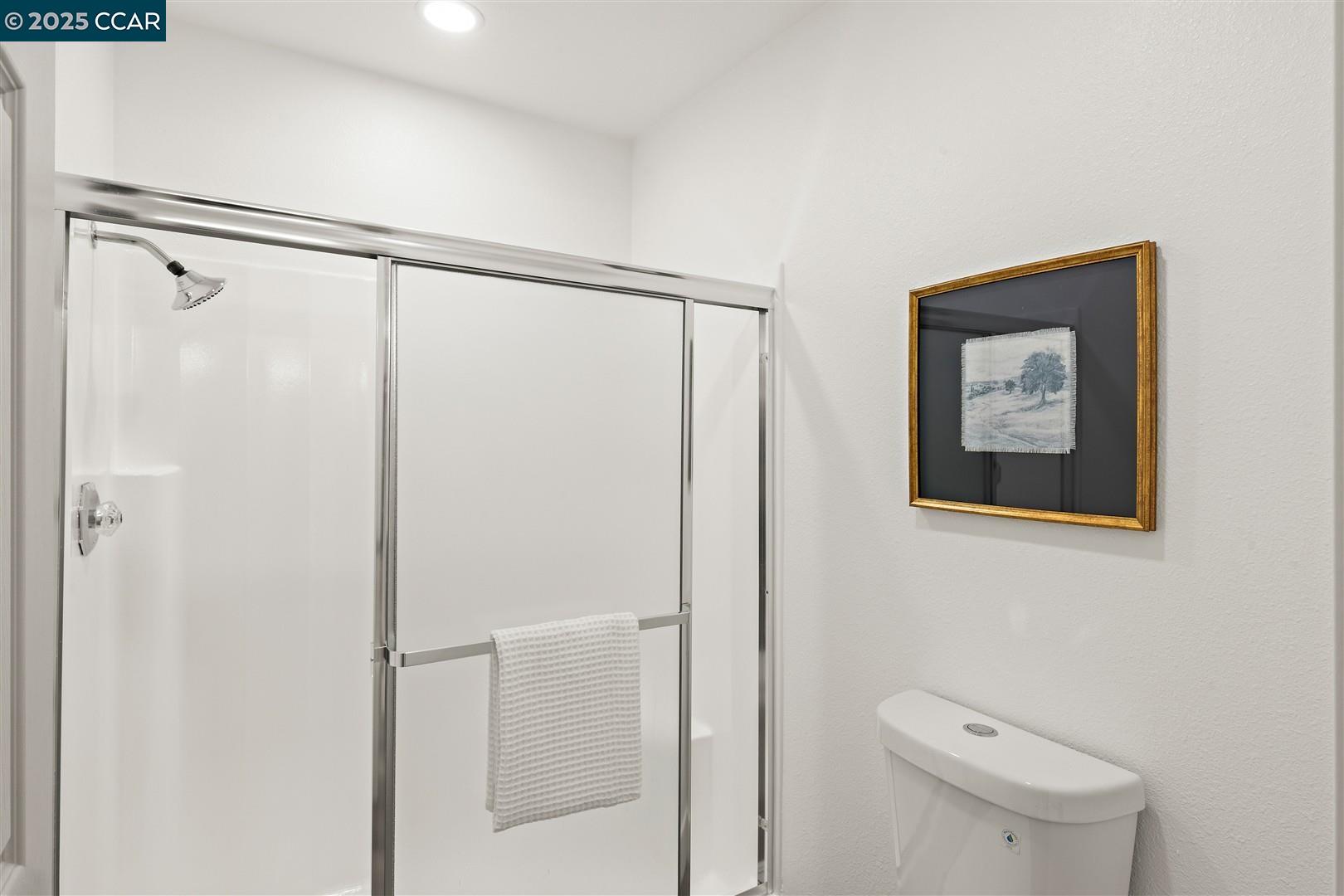 3575 Desanie Circle Bay Point, CA 94565 - Photo 23 of 37 a bathroom with a shower and a toilet