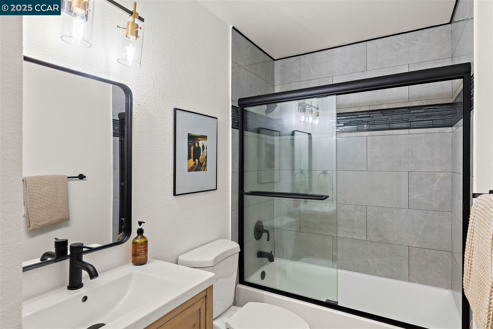 3575 Desanie Circle Bay Point, CA 94565 - Photo 25 of 37 a bathroom with a shower and a sink