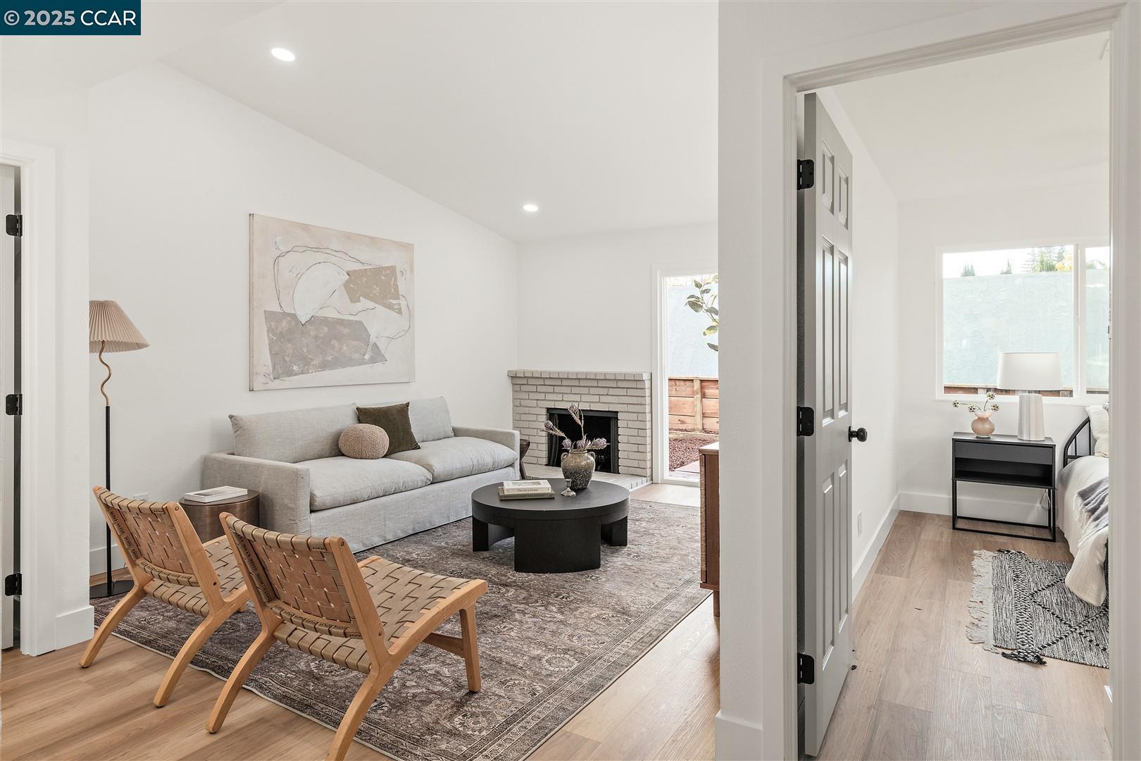 3575 Desanie Circle Bay Point, CA 94565 - Photo 26 of 37 a living room with furniture and a fireplace