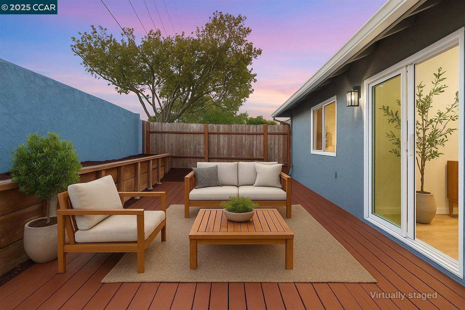 3575 Desanie Circle Bay Point, CA 94565 - Photo 32 of 37 a balcony with wooden floor and outdoor seating