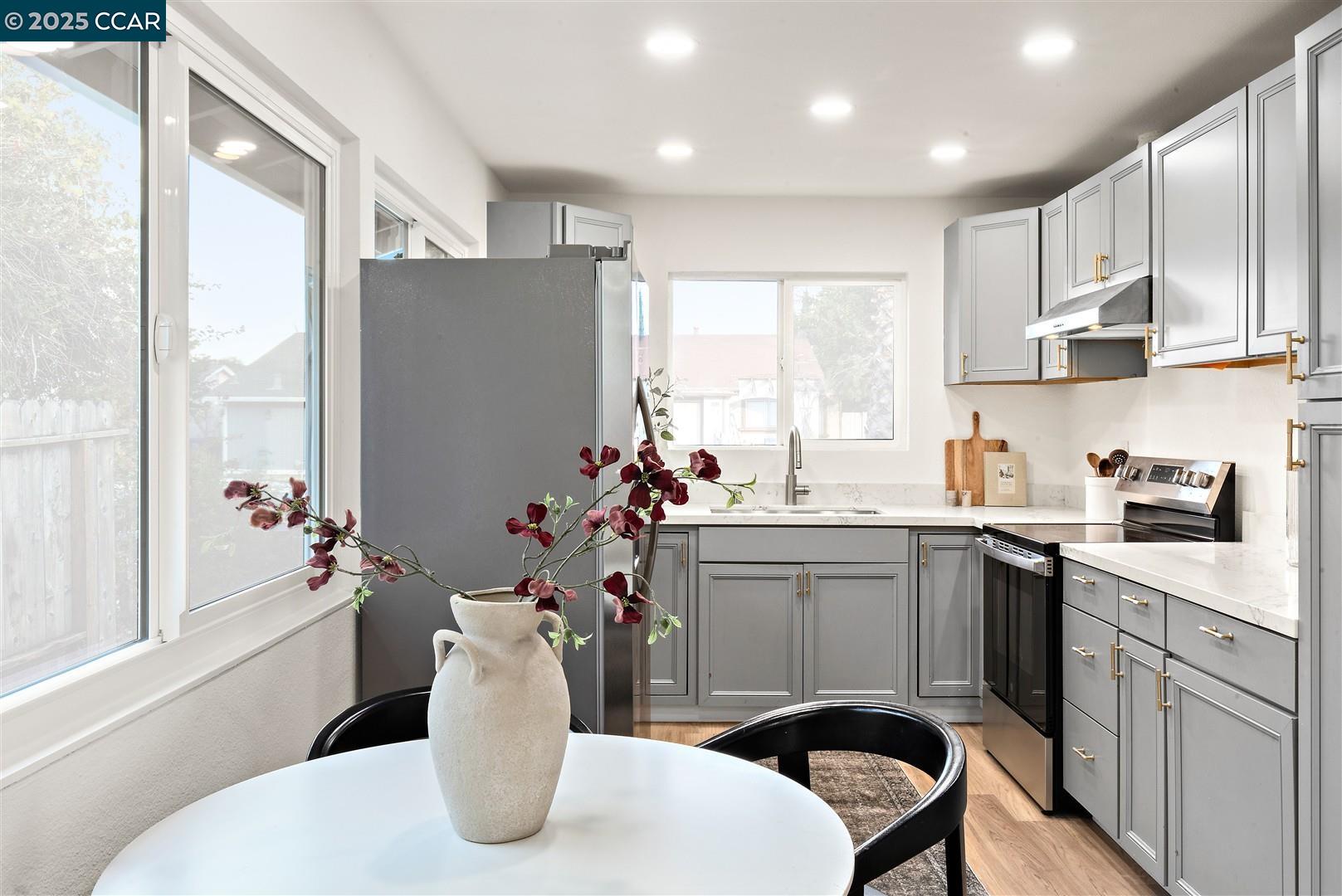 3575 Desanie Circle Bay Point, CA 94565 - Photo 7 of 37 a kitchen with a sink stove and cabinets
