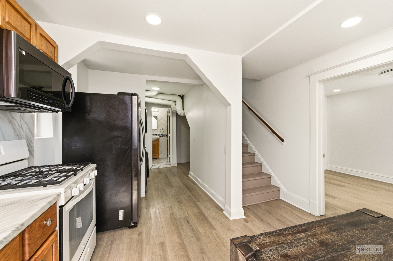 363 Franklin Boulevard Elgin, IL 60120 - Photo 16 of 32 a kitchen with a refrigerator and a stove top oven