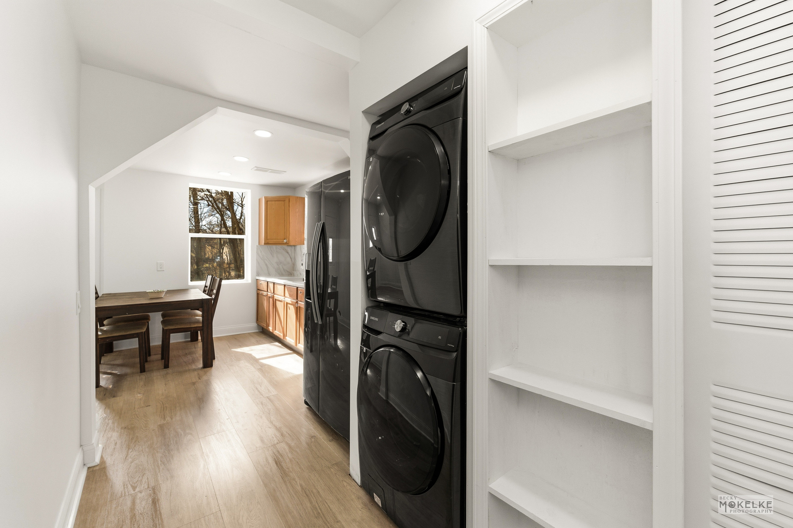 363 Franklin Boulevard Elgin, IL 60120 - Photo 17 of 32 a utility room with cabinets dryer and washer