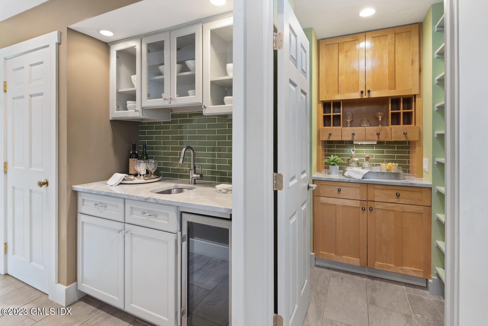 22 Drummer Lane Redding, CT 06896 - Photo 11 of 40 a kitchen with a sink and cabinets