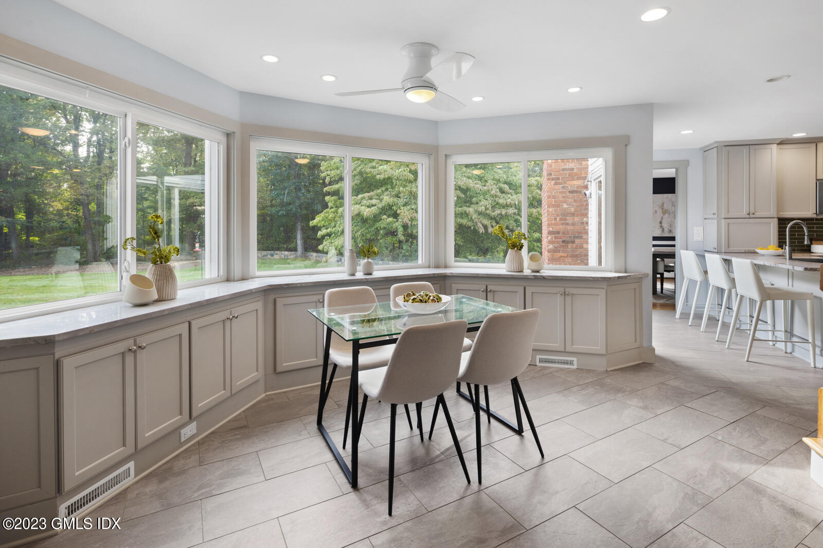 22 Drummer Lane Redding, CT 06896 - Photo 12 of 40 a view of a dining room with furniture window and outside view