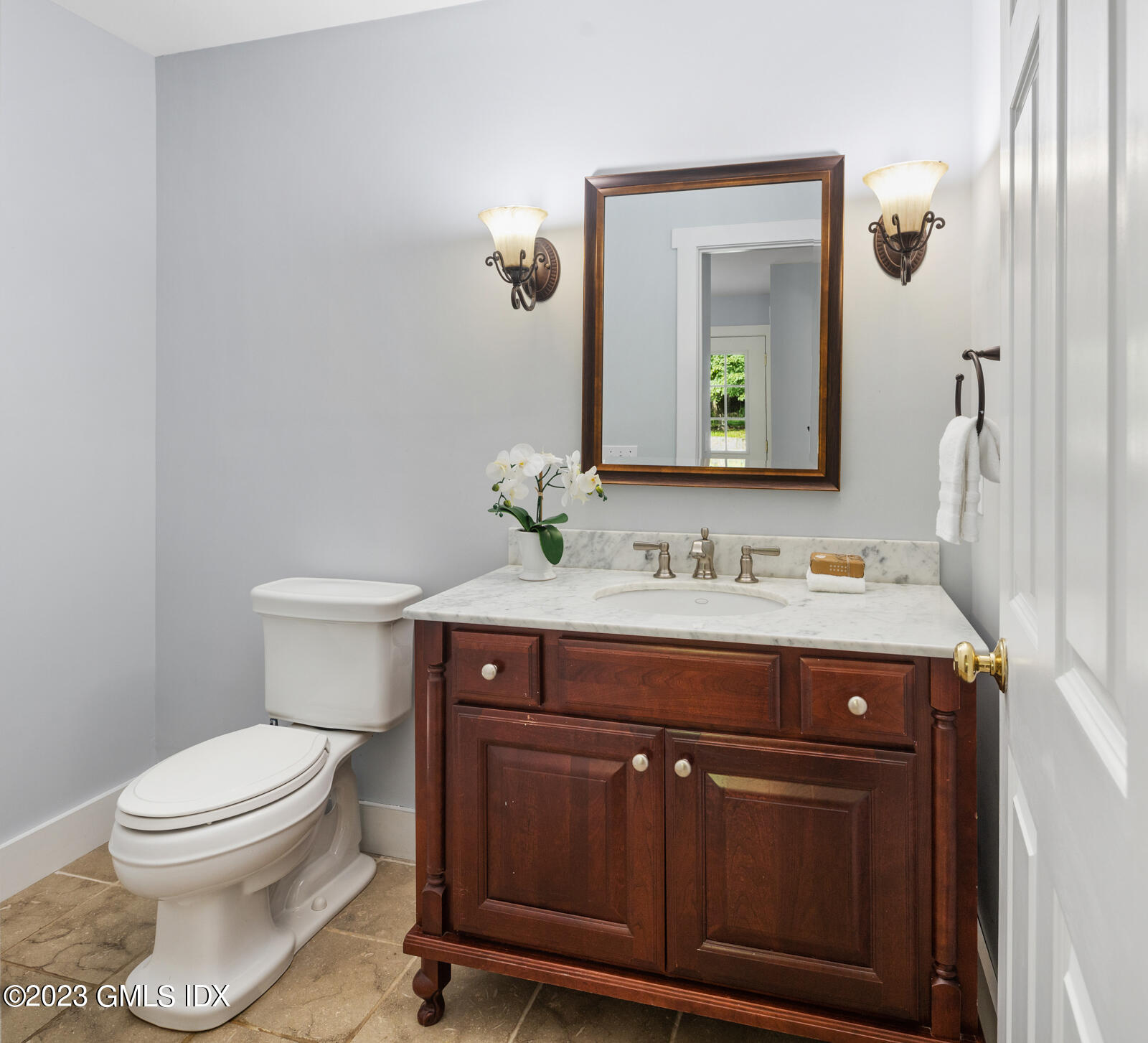 22 Drummer Lane Redding, CT 06896 - Photo 13 of 40 a bathroom with a granite countertop toilet sink and mirror