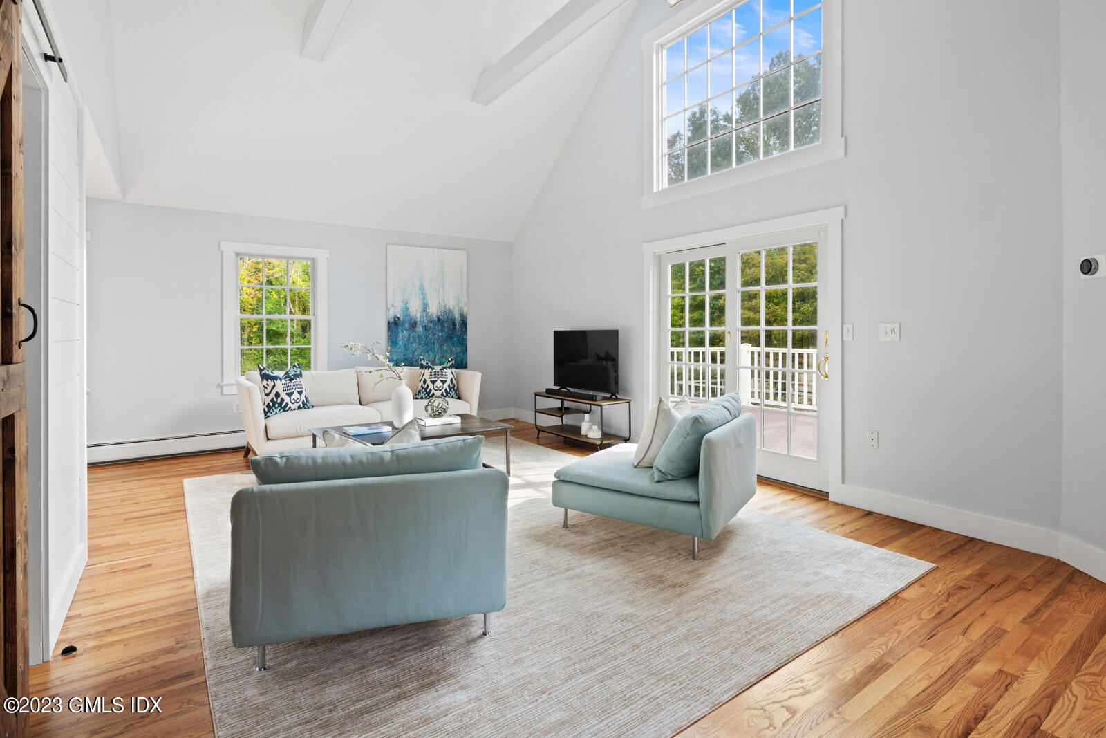 22 Drummer Lane Redding, CT 06896 - Photo 14 of 40 a living room with furniture and a window