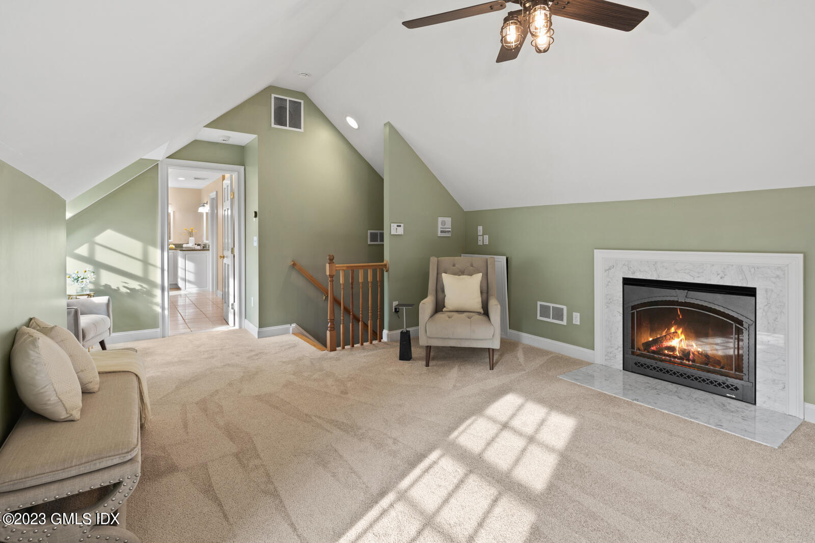 22 Drummer Lane Redding, CT 06896 - Photo 25 of 40 a living room with furniture and a fireplace