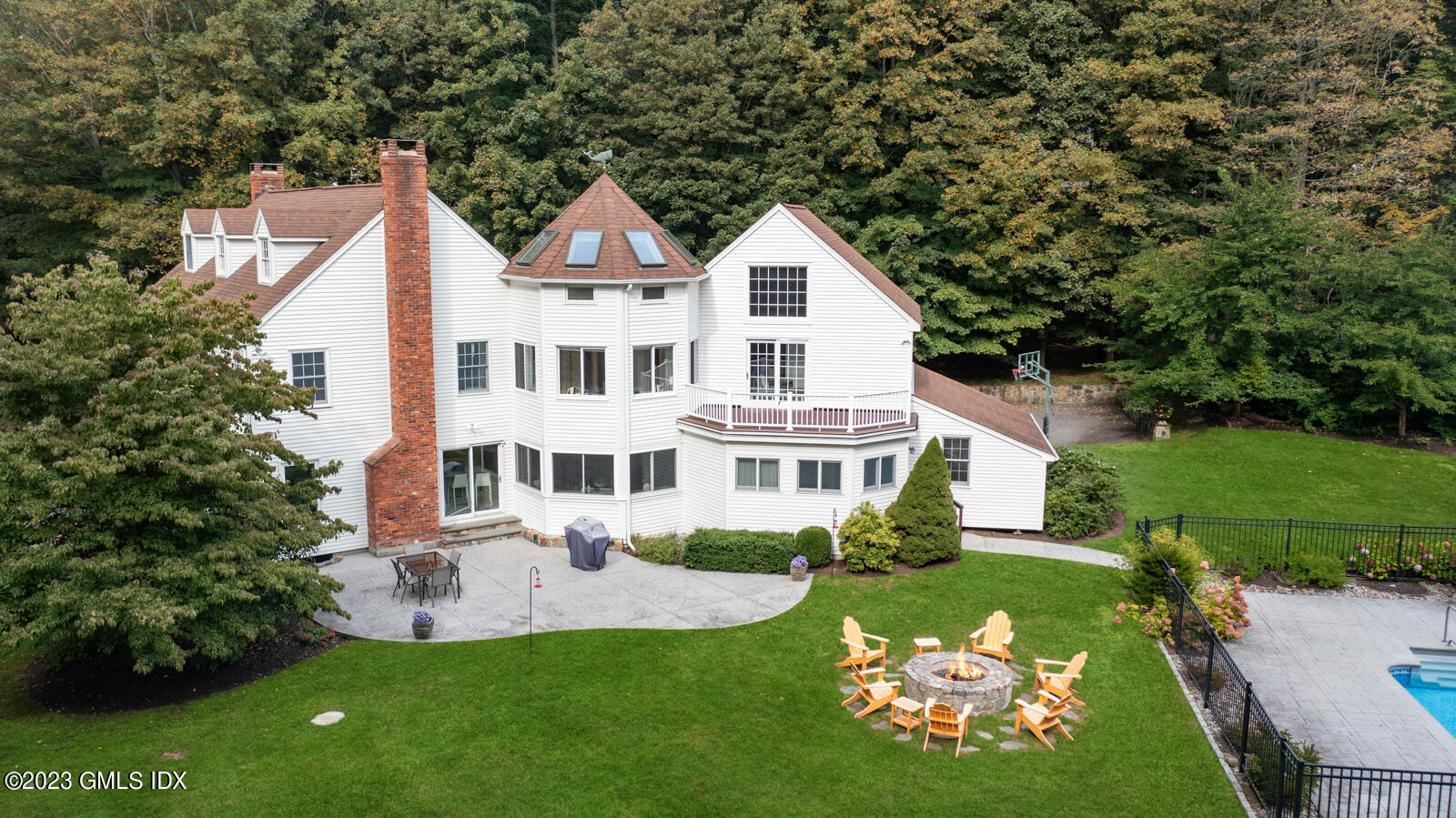 22 Drummer Lane Redding, CT 06896 - Photo 29 of 40 a front view of a house with a yard