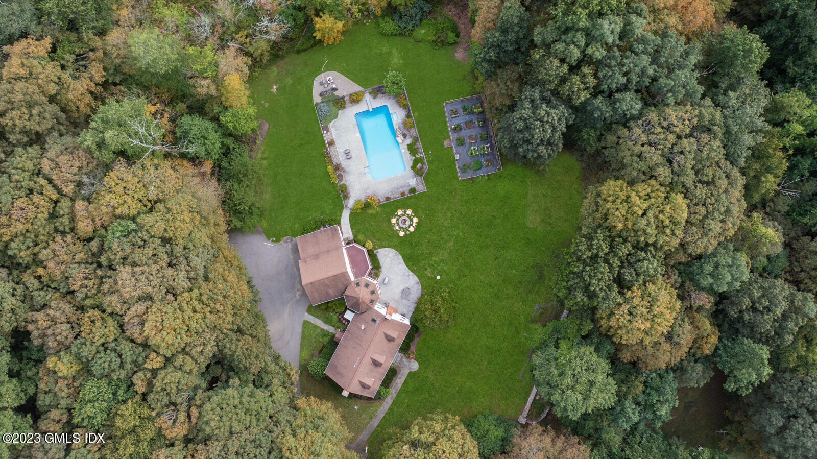 22 Drummer Lane Redding, CT 06896 - Photo 36 of 40 an aerial view of a house with outdoor space pool seating area and yard