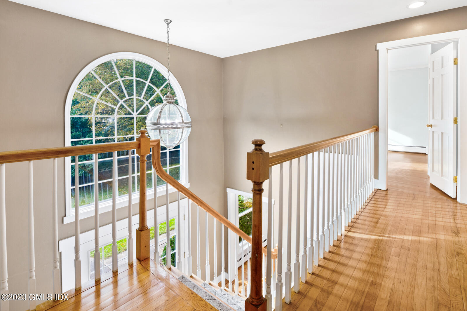 22 Drummer Lane Redding, CT 06896 - Photo 4 of 40 a view of an entryway with wooden floor