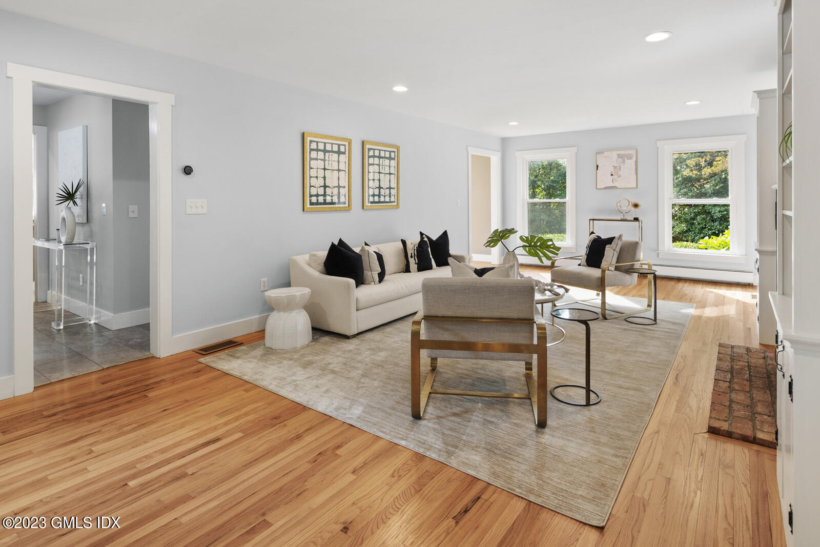 22 Drummer Lane Redding, CT 06896 - Photo 6 of 40 a living room with furniture and wooden floor