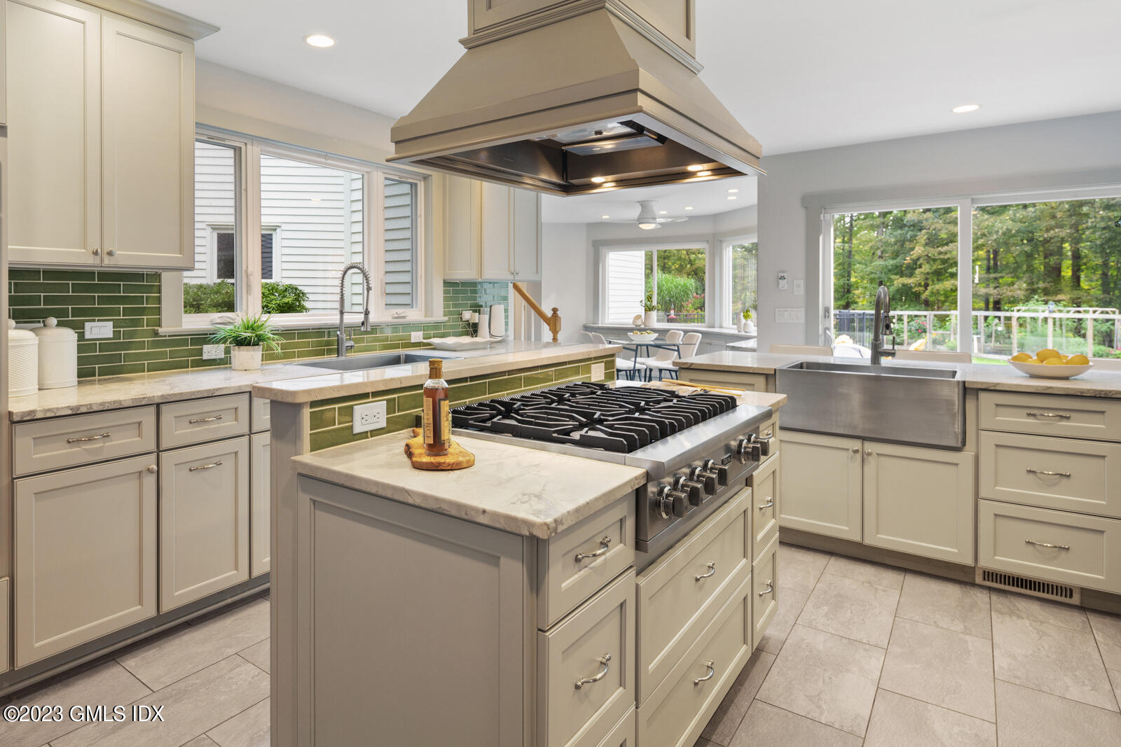 22 Drummer Lane Redding, CT 06896 - Photo 9 of 40 a kitchen with a stove a sink and a refrigerator