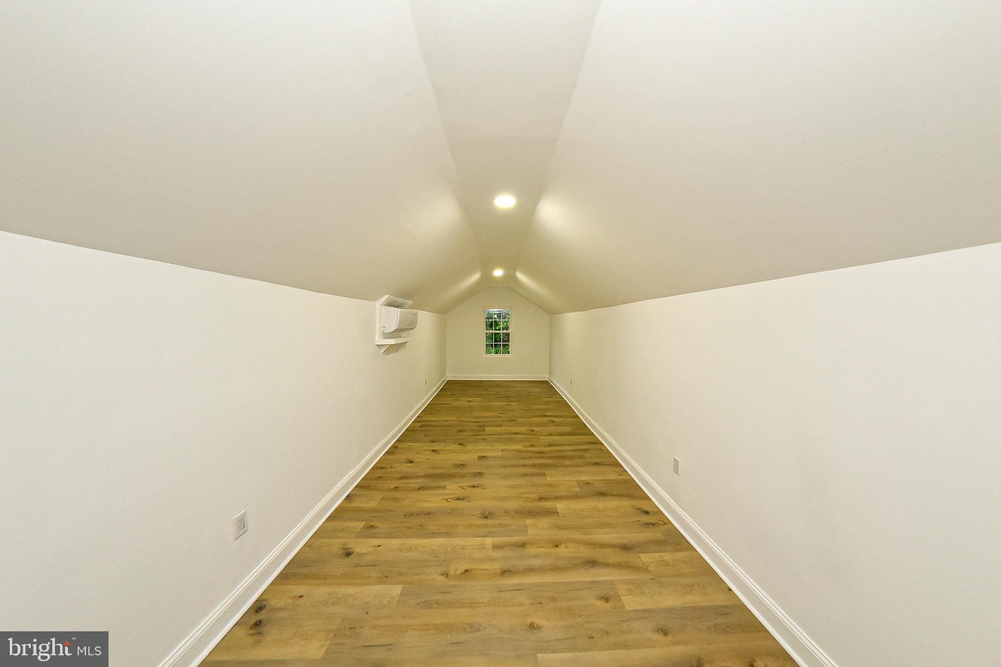 3704 Suitland Road Southeast Washington, DC 20020 - Photo 43 of 70 a view of a hallway with wooden floor