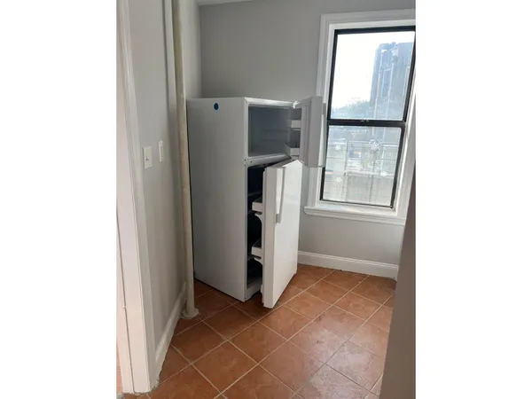 a view of an entryway with hallway