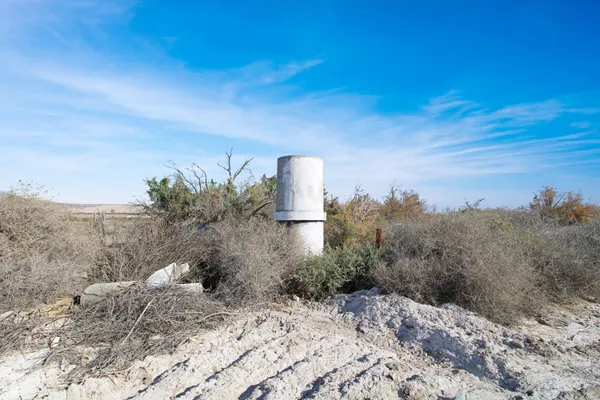 a view of a water fountain and a signage