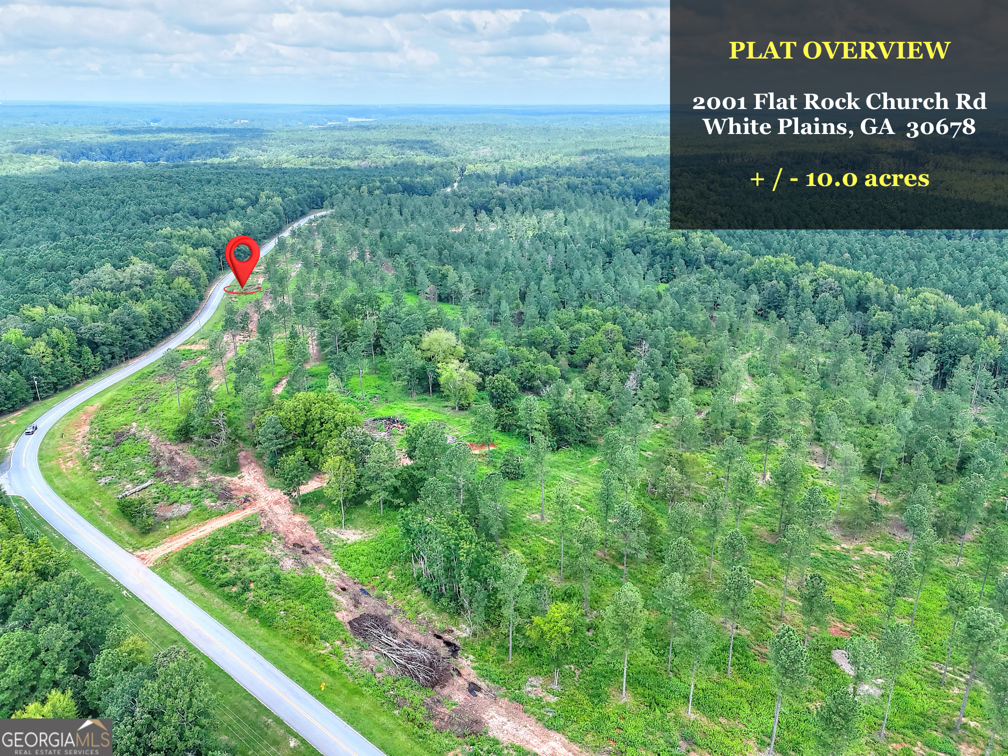 2001 Flat Rock Church Road White Plains, GA 30678 - Photo 4 of 18 a view of a lush green field