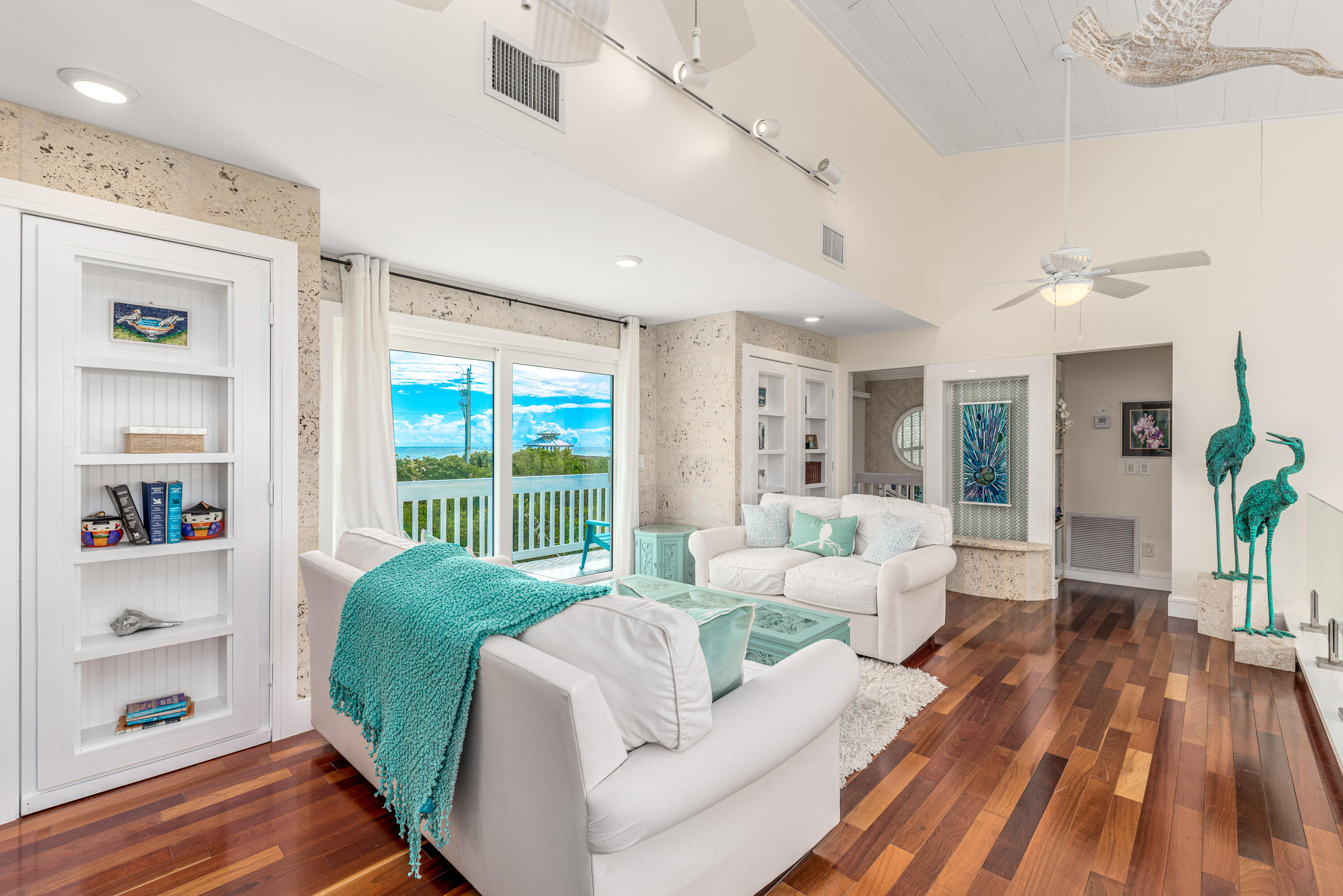 1470 Southeast MacArthur Boulevard Stuart, FL 34996 - Photo 11 of 15 a living room with furniture and wooden floor