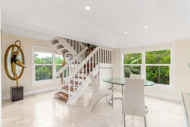a view of a living room with furniture