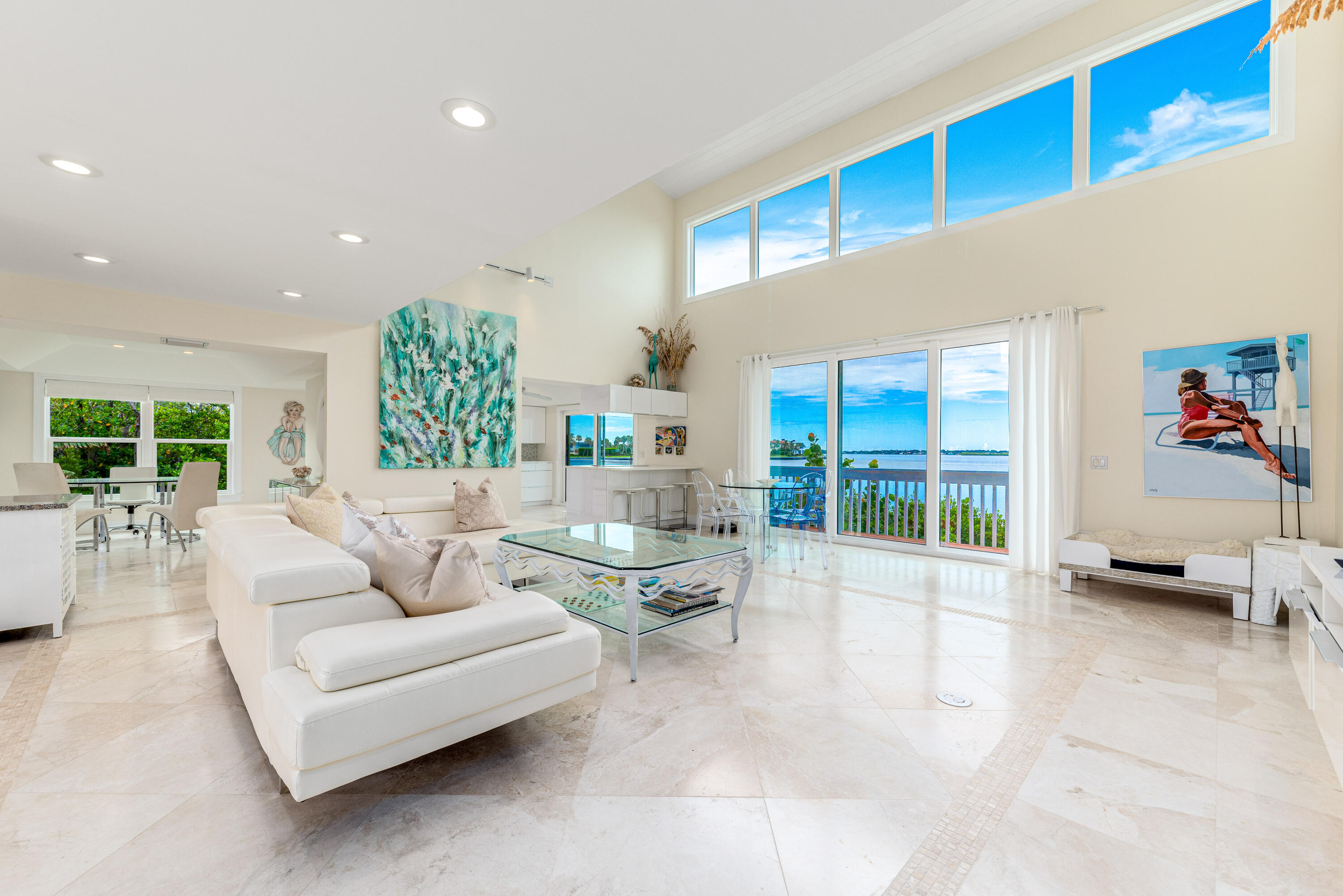 1470 Southeast MacArthur Boulevard Stuart, FL 34996 - Photo 4 of 15 a living room with furniture and a large window