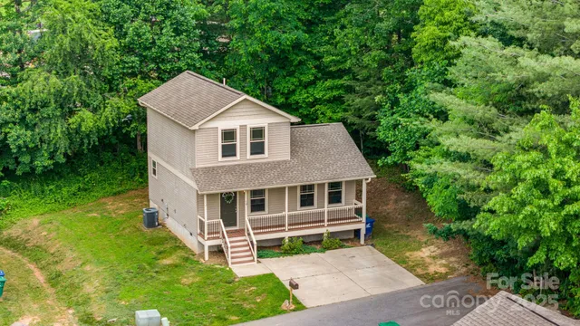 a house view with a garden space