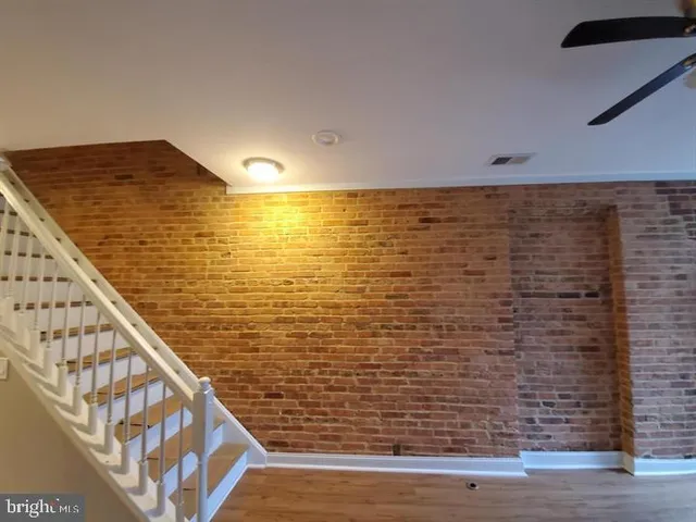 a kitchen with a sink stove and microwave