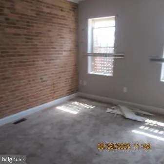 a bathroom with a small window