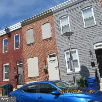 a car parked on the side of a street