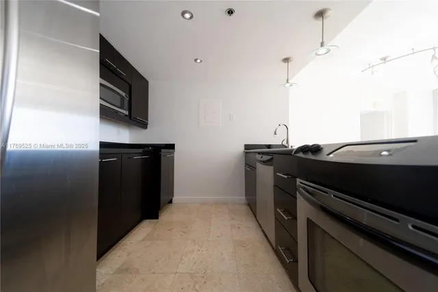 $450,000 | 7601 East Treasure Drive, Unit 1523, North Bay Village, FL 33141