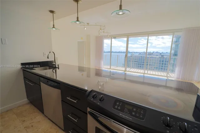 $450,000 | 7601 East Treasure Drive, Unit 1523, North Bay Village, FL 33141