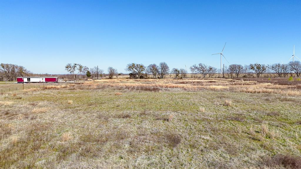 4050 Southwest 4050 Hubbard, TX 76648 - Photo 22 of 24 a view of a dry yard with wooden fence