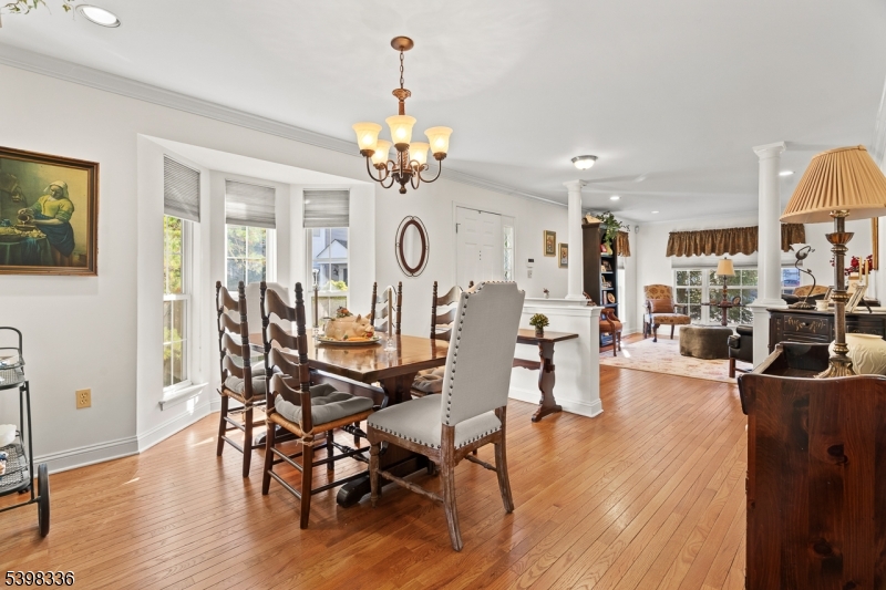 14 Minuteman Court Bernards, NJ 07920 - Photo 13 of 34 a view of a dining room with furniture and wooden floor