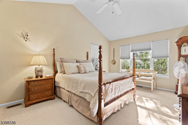 14 Minuteman Court Bernards, NJ 07920 - Photo 19 of 34 a bed room with a bed and a window