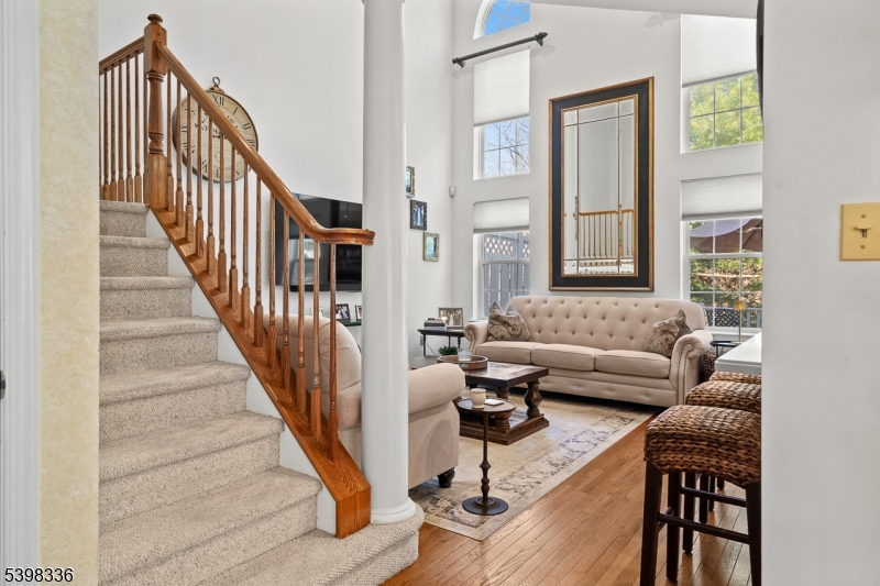 14 Minuteman Court Bernards, NJ 07920 - Photo 7 of 34 a living room with furniture and a wooden floor